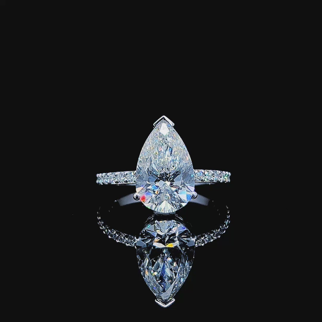 4ct Pear‑Cut Lab‑Grown Diamond Ring with Side Stones in 14K Gold